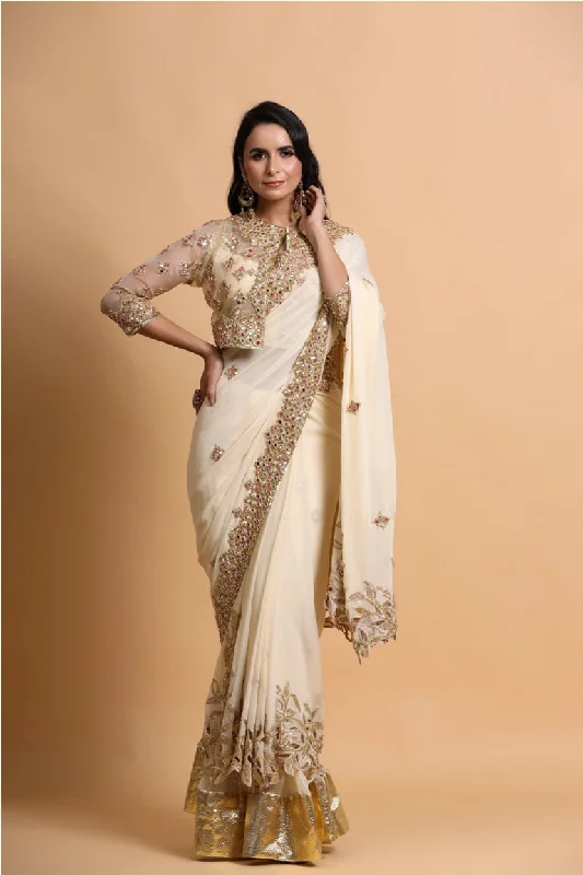 Fawn cutwork saree with strap blouse and jacket Belted Jacket Elasticated Jacket Padded Jacket Fawn cutwork saree with strap blouse and jacket Belted Jacket Elasticated Jacket Padded Jacket